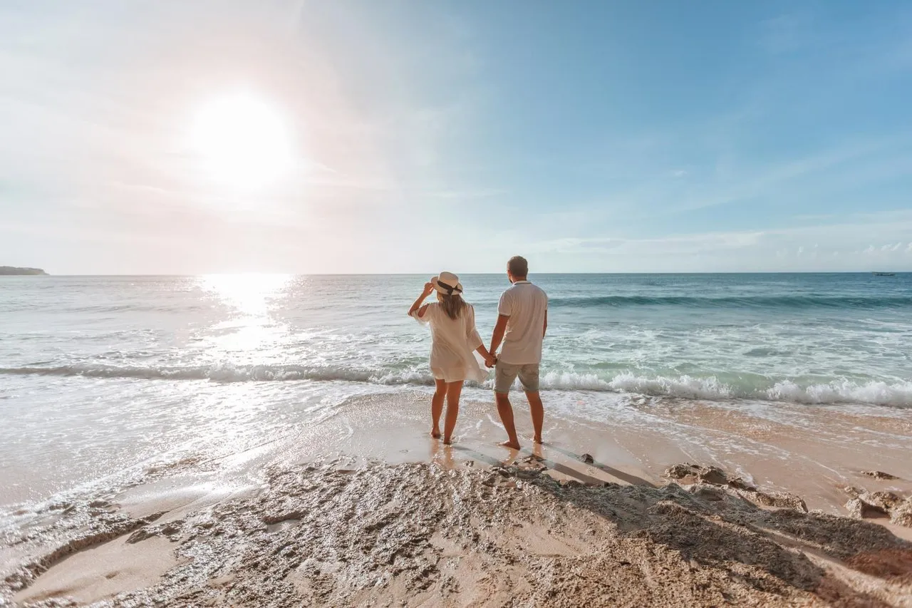 Couple on a Fiji beach at sunset